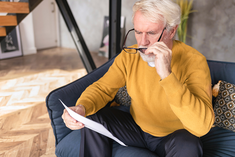 Man reading a letter