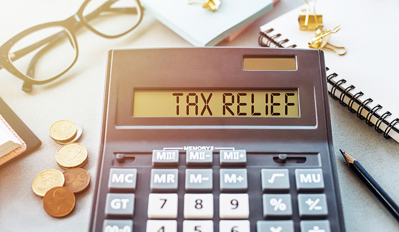 Tax Relief written on a Calculator